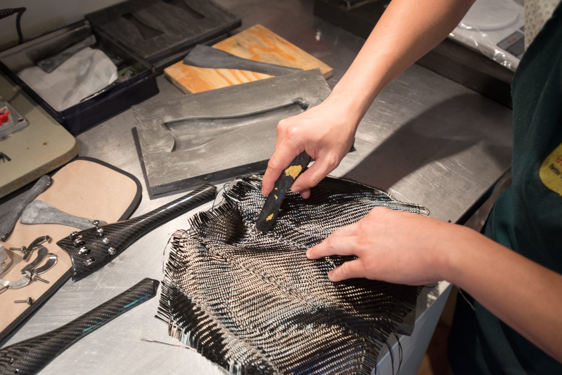 Laying initial outer layer fabric on mold